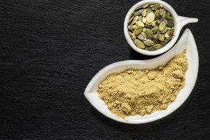 Pumpkin Seeds And Pumpkin Flour On The Surface Of The Shale